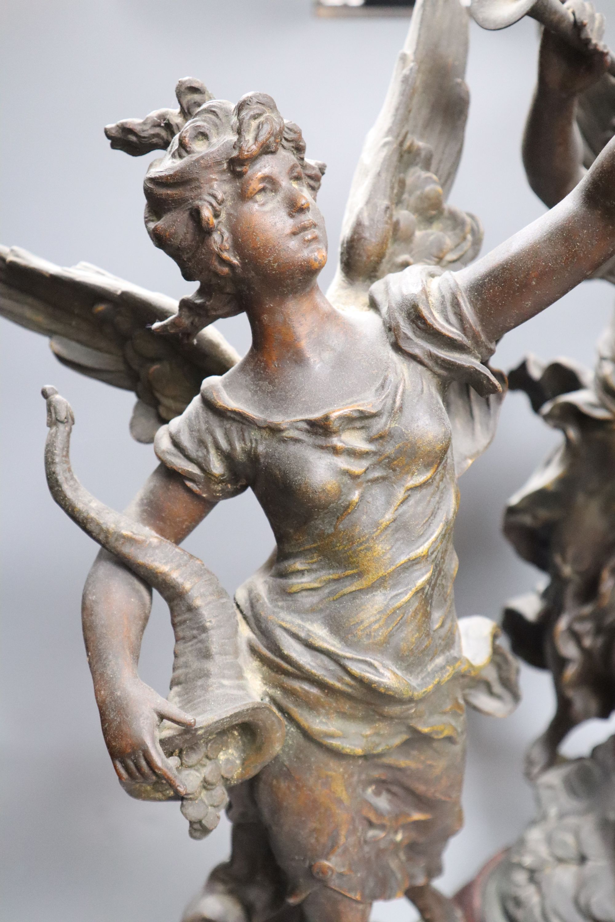 After Moreau. A pair of French spelter figures, height 72cm